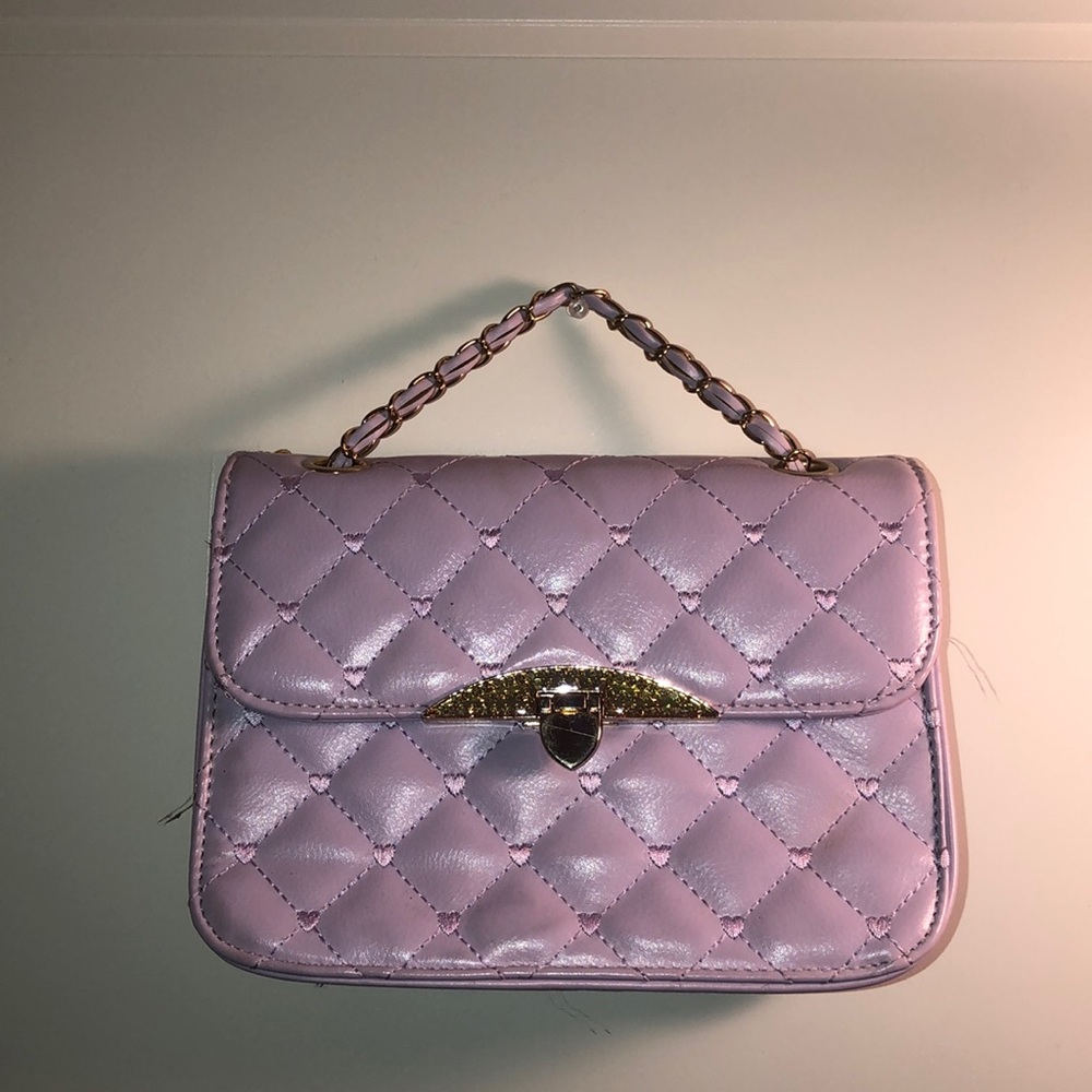 Super cute lavender hand bag gold accessories